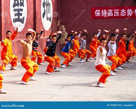 The Group Of Shaolin Children Monk Was Training Kungfu Inside The