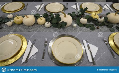 Lovely Thanksgiving Dinner Table Waiting To Be Filled With