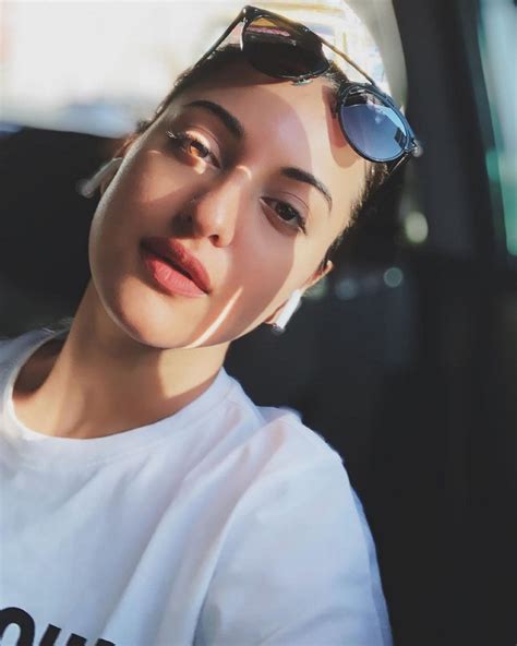 Sonakshi Sinha Strikes A Beautiful Sun Kissed Pose In Her Parked Car