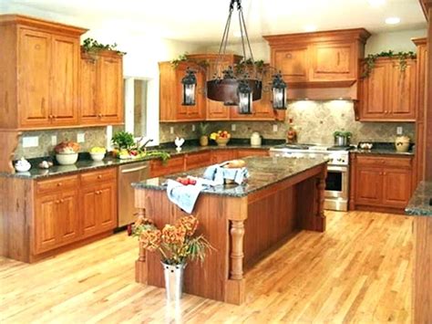 Okay, i know this post is about how to work around your oak cabinets without painting them, but this is something to consider if a little bit of painting is an option. kitchens with medium oak cabinets and dark wood floors ...