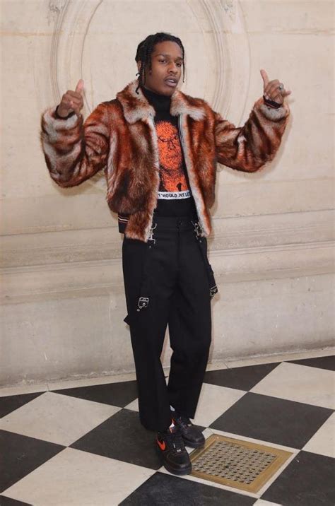 Asap Rocky Wears Dior Homme Fur Jacket Turtleneck Sweater Pants And