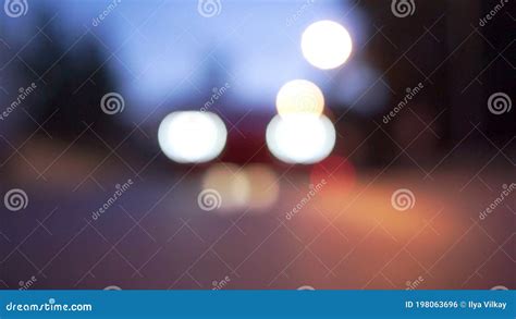 The Round Colorful Bokeh Shine From Car Lights In Traffic Jam On City