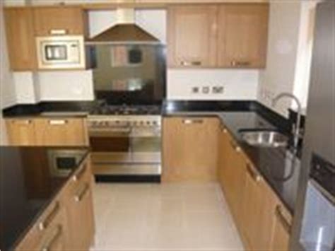Under tile extractor fans are perfect to be fitted between the bathroom tiles as extra tile can work as fan front base make the fan almost invisible. Kitchen Fitters Bedford - PMD Construction (MK) Limited