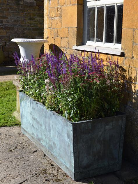 All of our planters come with a 10 year warranty! The Rectangular Copper Garden Planter - Large Wide - ARCHITECTURAL HERITAGE