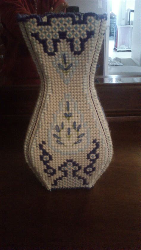 A Vase Made Out Of Beads Sitting On Top Of A Table