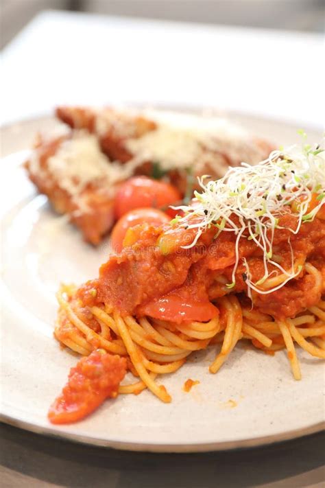 Spaghetti Bolognese Tomato Sauce With Fried Chicken Stock Photo Image