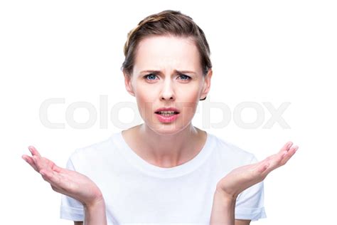Confused Woman With Shrug Gesture Stock Image Colourbox