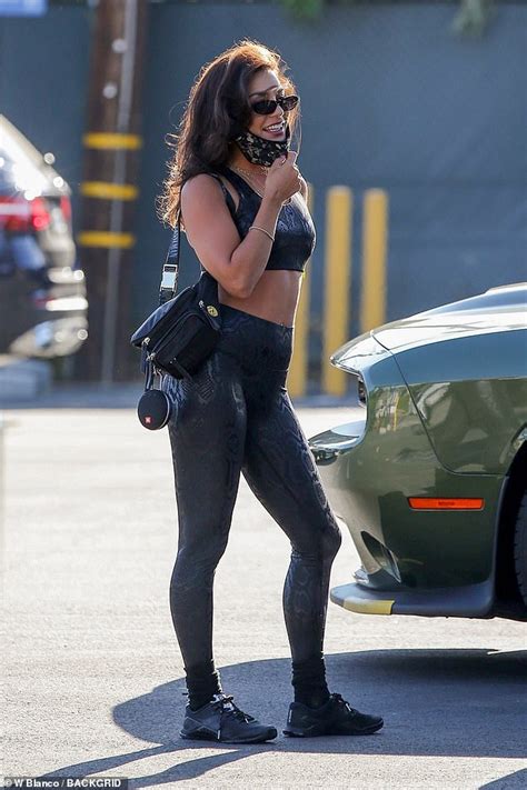 Vanessa Hudgens Shows Off Gym Honed Figure In Skintight Black Crop Top And Leggings In La