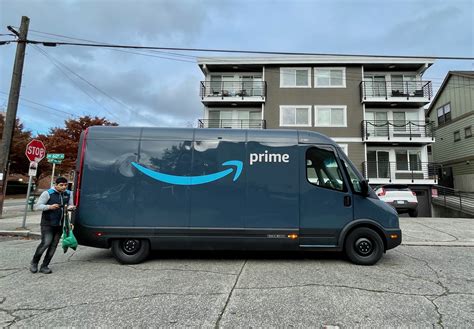 ‘It’s like driving a spaceship’: Amazon’s Rivian electric delivery vans