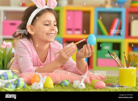 Cute Girl Paint Easter Eggs Stock Photo Alamy