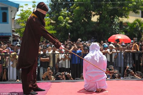 unmarried couples are flogged for violating sharia law in indonesia daily mail online