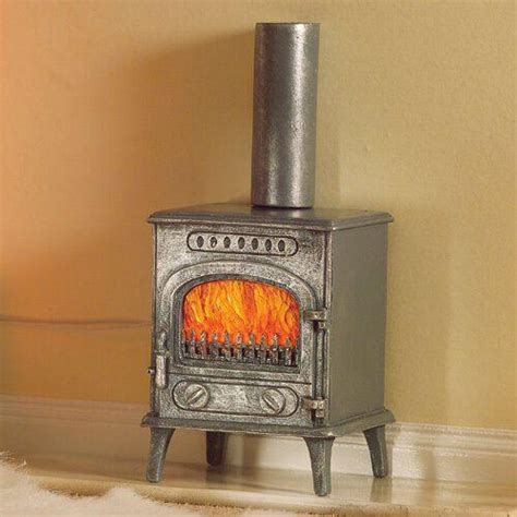 Moreover, the wood that you insert in the stove will be able to heat up to 1600 square feet. The Dolls House Emporium Wood Burning Stove