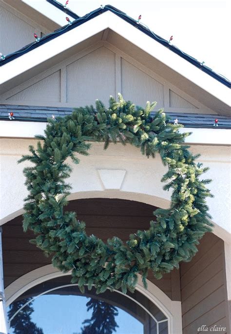 House with christmas wreaths on front door in beacon hill area. How to Hang a Giant Outdoor Christmas Wreath - Ella Claire ...