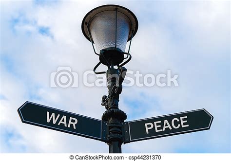 War Versus Peace Directional Signs On Guidepost Street Lighting Pole