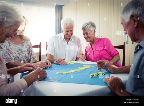 Group Of Seniors Playing Dominoes Stock Photo Alamy