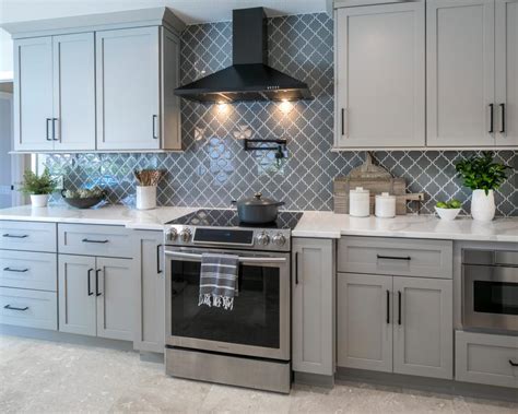 Gray Kitchen With Decorative Counter To Ceiling Backsplash Hgtv