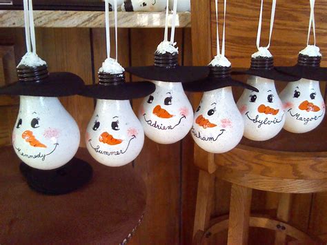 Snowman light bulb ornaments I made for my grankids this Christmas