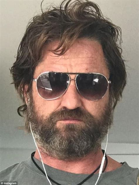 gerard butler sobs as he shaves off beard to do reshoots daily mail online