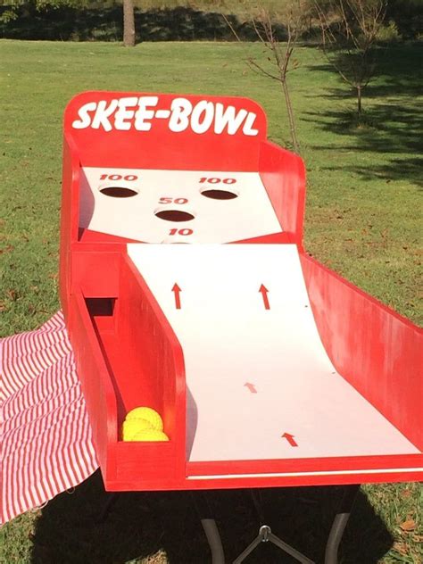 Adults bring their kids to carnivals so that they can hop on rides, play games and win prizes. Skee Ball Style Carnival Game. Perfect for Trade Show ...