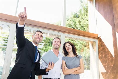 Real Estate Agent Showing Couple New Home Stock Image Image Of Future Fondness 66963649