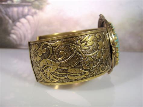 Southwestern Brass Floral Cuff Bracelet With Light Green Lucite