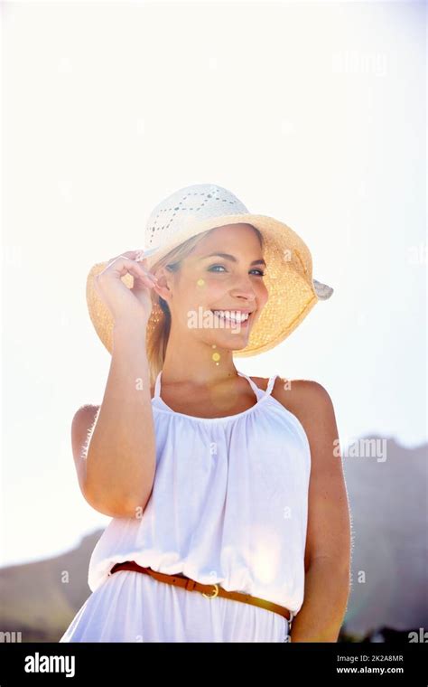 Styled For Summer Portrait Of A Beautiful Young Woman Enjoying A