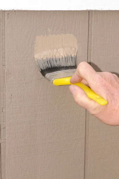 Hand Painting T111 Siding House Ensuring Get Paint Grooves Stock Photo