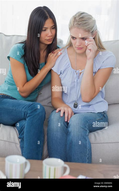 Friend Comforting Her Crying Friend Stock Photo Alamy