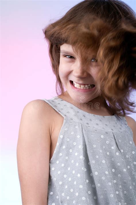 Pretty 8 Year Old Girl In Silver Dress Royalty Free Stock Photography