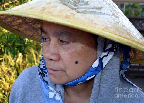 Attractive Filipina Woman With A Mole On Her Cheek And Wearing A Conical Hat Photograph By Jim