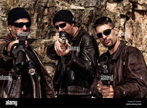View Of A Group Of Gang Members With Guns Stock Photo Alamy