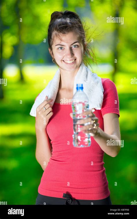 Young Woman Drinking Water Stock Photo Alamy