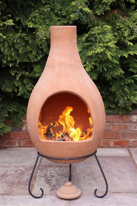 These ceramic stones take the intense heat of a fire pit unlike real. Clay Chimenea JUMBO Terracotta Chiminea Patio Heater Fire ...