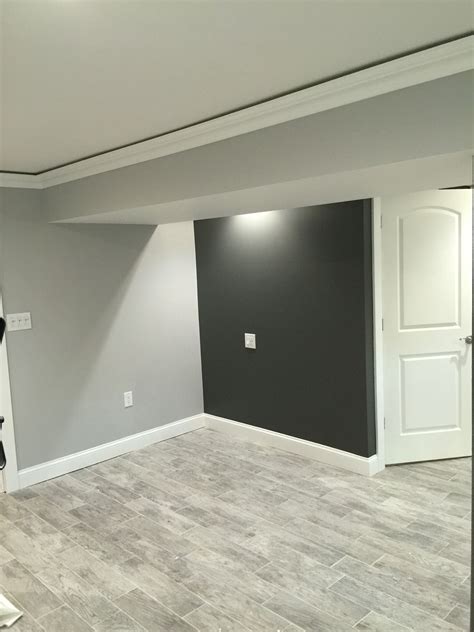 If your basement is already light you can paint it just about any color you want. Kendall charcoal Benjamin Moore and stonington gray ...