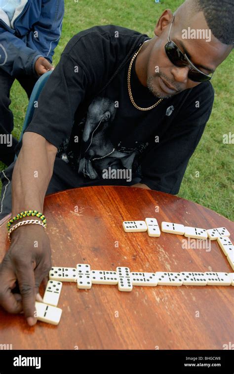 Black Men Play Dominos Hi Res Stock Photography And Images Alamy