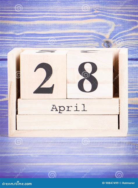 April 28th Date Of 28 April On Wooden Cube Calendar Stock Image