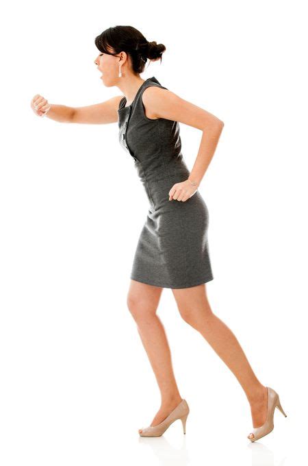 Business Woman In A Hurry Isolated Over A White Background