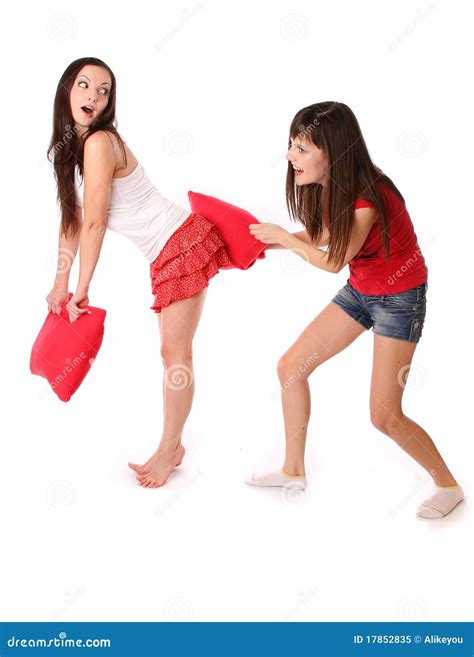 two girls fighting on the pillows stock image image of hitting indoors 17852835