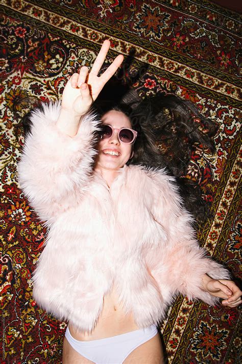 Young Woman Wearing Fur Coat Next To The Skin Del Colaborador De Stocksy Danil Nevsky Stocksy