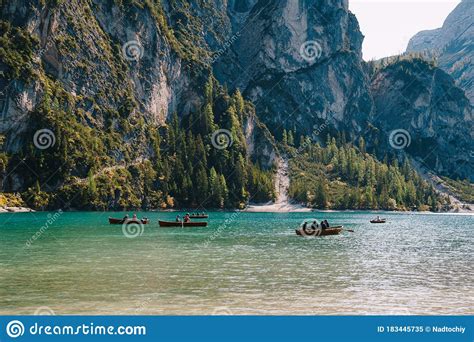 Boats On Lago Di Braies Mountain Lake In Dolomites Italy Stock Photo