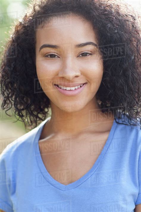 Close Up Of Smiling Black Woman Outdoors Stock Photo Dissolve