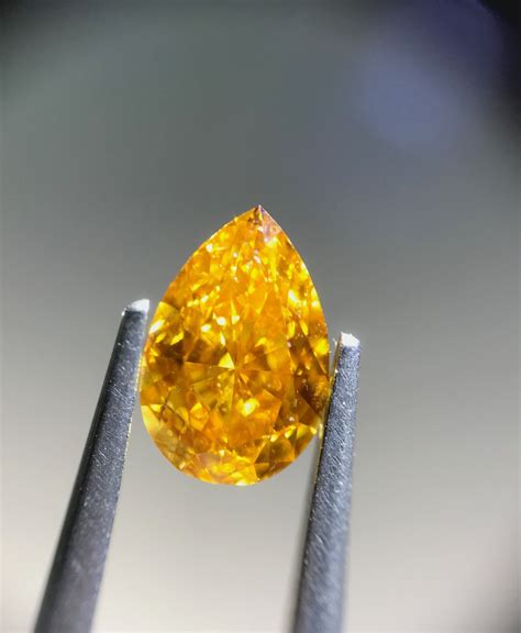 103 Carat Fancy Vivid Orange Yellow Diamond Pear Shape