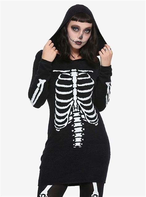 This is our rib cage design based off the off of our comic wardreams, more pictures to come. Rib Cage Girls Hooded Tunic Sweater | Hooded tunic, Tunic ...