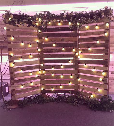 With Rustic Wood Festoons And Foliage Our Backdrop Is The Perfect