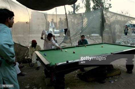 Pakistani Men Play Pool In A Slum Of Karachi 03 January 2008 News