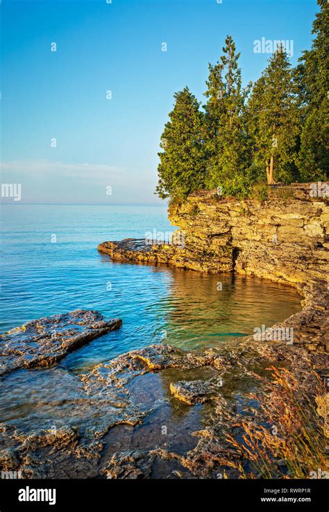 Early Morning View Of A Rocky Cliff On The Coast Of Lake Michigan From
