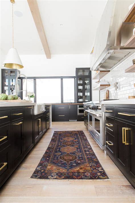 I like how the entire room's surfaces are in white. Modern Mountain House Kitchen | COCOCOZY