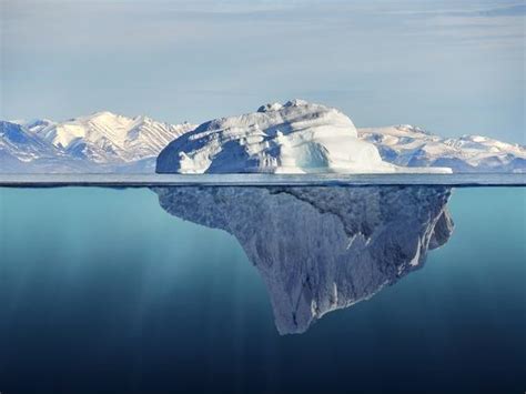 Iceberg With Above And Underwater View Taken In Greenland
