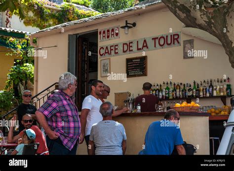 Corsica People At The Outdoor Counter Of The Café De La Tour The Bar