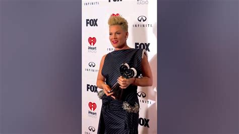 Pink Posing For Photos With Her 2023 Iheart Awards Trophypink